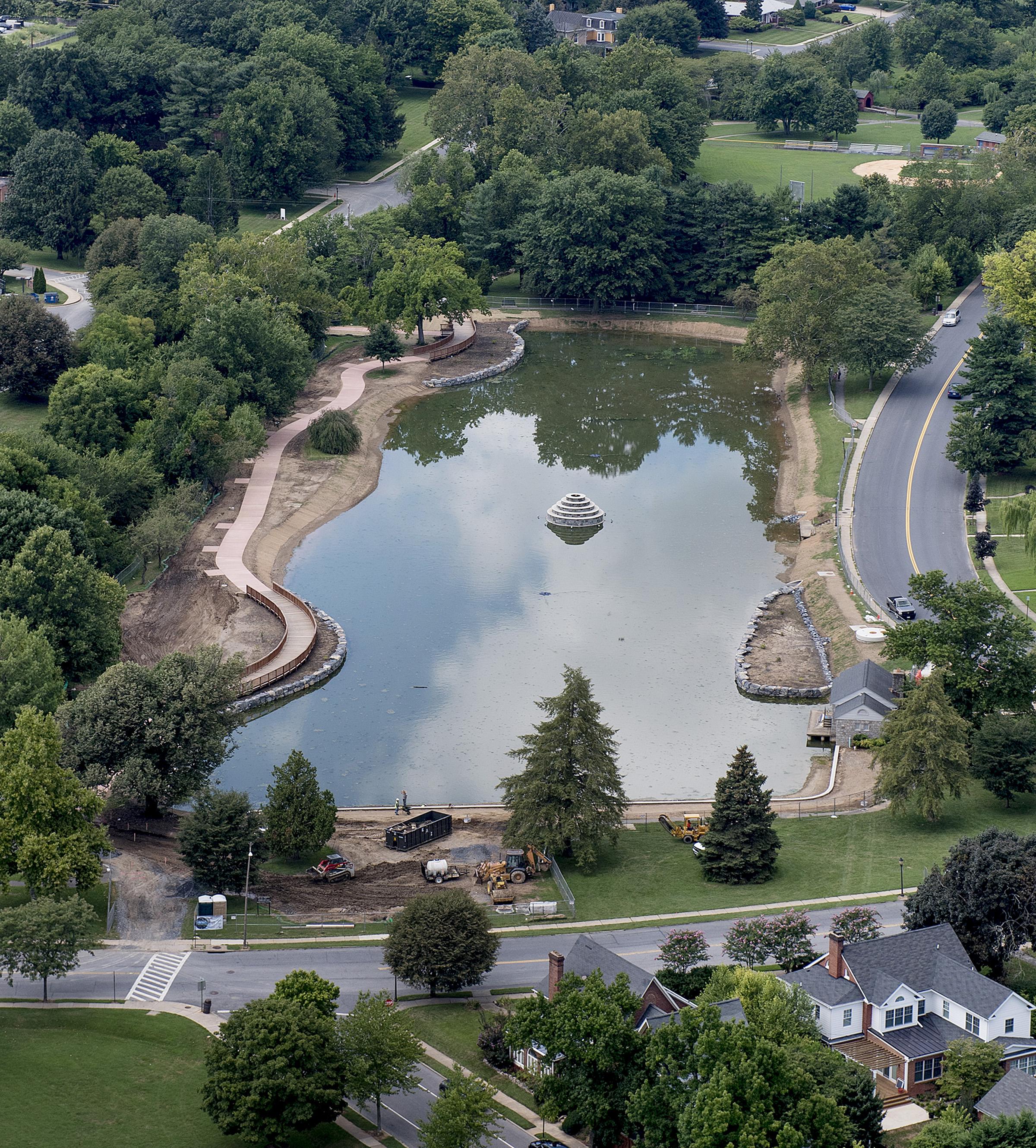 The nearly complete Culler Lake along West Second Street in Baker Park is filling and final landscaping is underway.